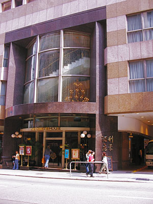 Charter House Hotel exterior in Causeway Bay - modern business hotel with glass facade and entrance