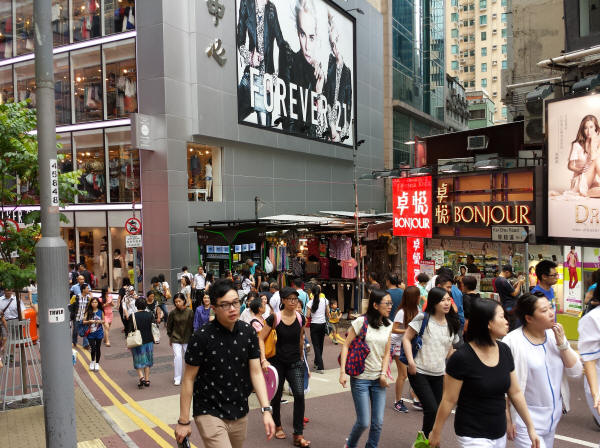 Shoppers walking along Yun Ping Road in Causeway Bay, Hong Kong