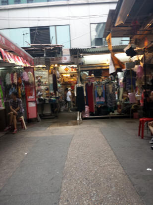 Times Square shopping mall with luxury brand storefronts